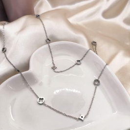 COLAR LONGO ESTRELA E TREVO REDONDO VAZADO