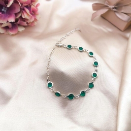 PULSEIRA COM PEDRAS VERDES REDONDAS