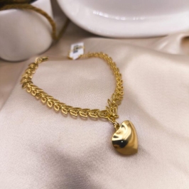 PULSEIRA FOLHAGEM VAZADA COM CORAÇÃO PENDURADO BOLEADO