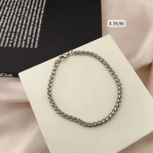 PULSEIRA EM AÇO ELO TRANÇADO TORCIDO