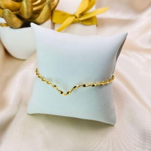 BRACELETE TORCIDO COM FORMATO EM V NO CENTRO