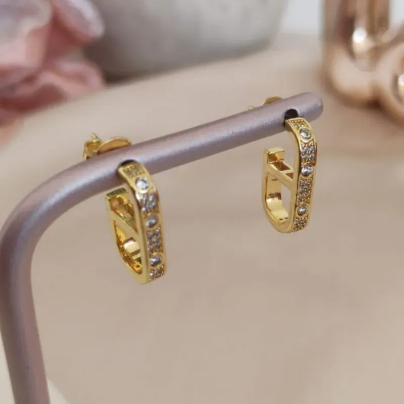 ARGOLA PARTIDA COM ZIRCONIA E MICRO ZIRCONIA NA FRENTE