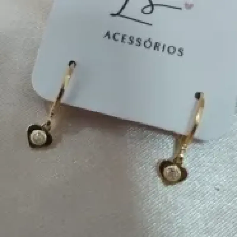 BRINCO ARTICULADOR PLACA DE CORAÇÃO COM PONTO DE LUZ