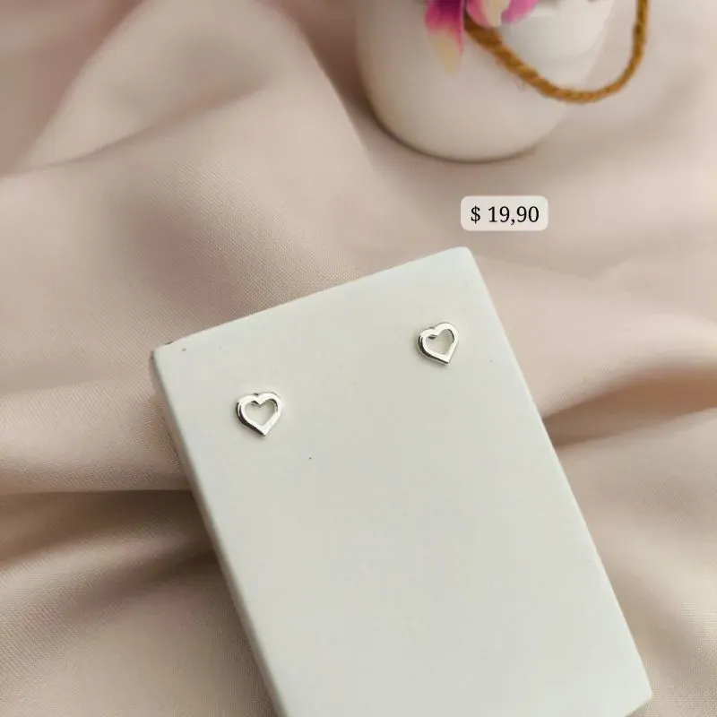 BRINCO CORAÇÃO VAZADO LISO B. A PRATA 925