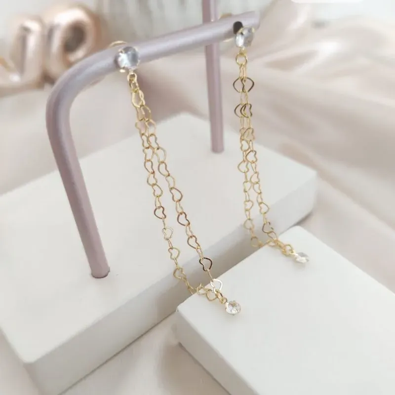 BRINCO CORRENTE DE CORAÇÕES ENTRELAÇADOS COM PONTO DE LUZ