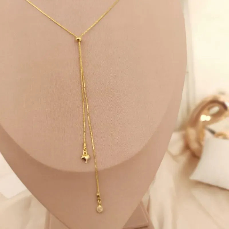 GRAVATINHA COM PONTO DE LUZ E CORAÇÃO BOLEADO