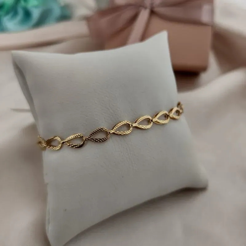 PULSEIRA FORMATO GOTA DE LADOs VAZADA