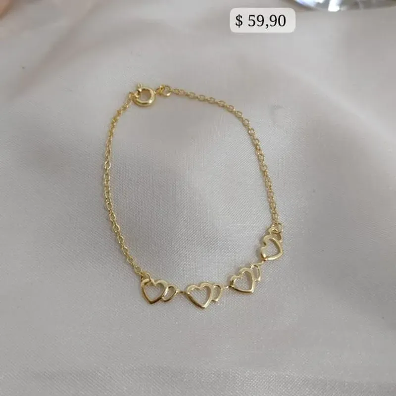 PULSEIRA INFANTIL COM CORAÇÕES LISOS VAZADOS