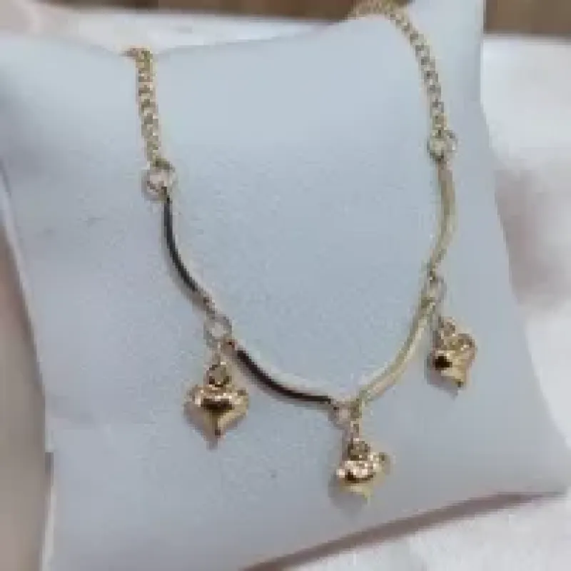 TORNIZELEIRA DE CORAÇÃO BOLEADO