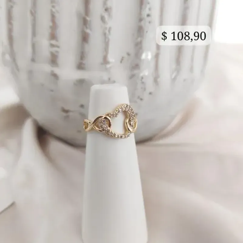 ANEL CORAÇÃO CRAVEJADO VAZADO COM INFINITO