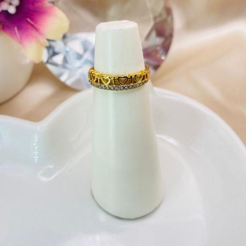 ANEL COM VARIOS CORAÇÕES VAZADOS E 1 FILA DE ZIRCONIA