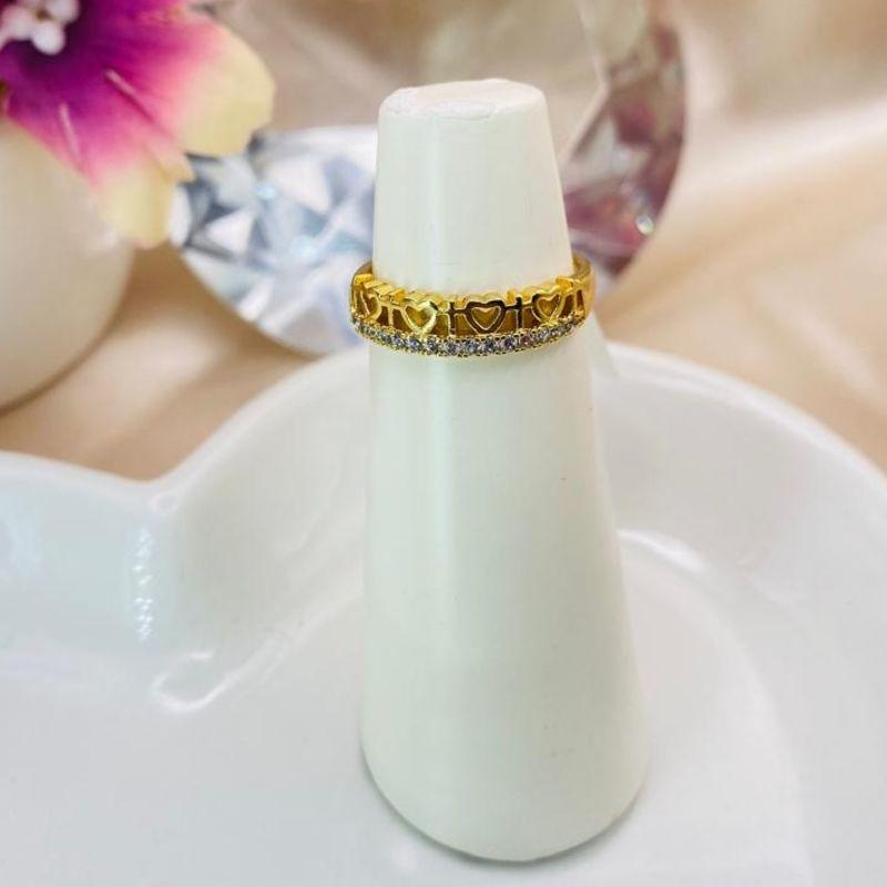 ANEL COM VARIOS CORAÇÕES VAZADOS E 1 FILA DE ZIRCONIA