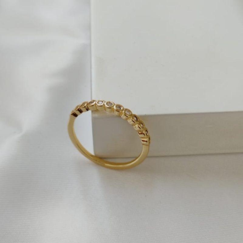 ANEL APARADOR COM DETALHES REDONDO E PEDRAS