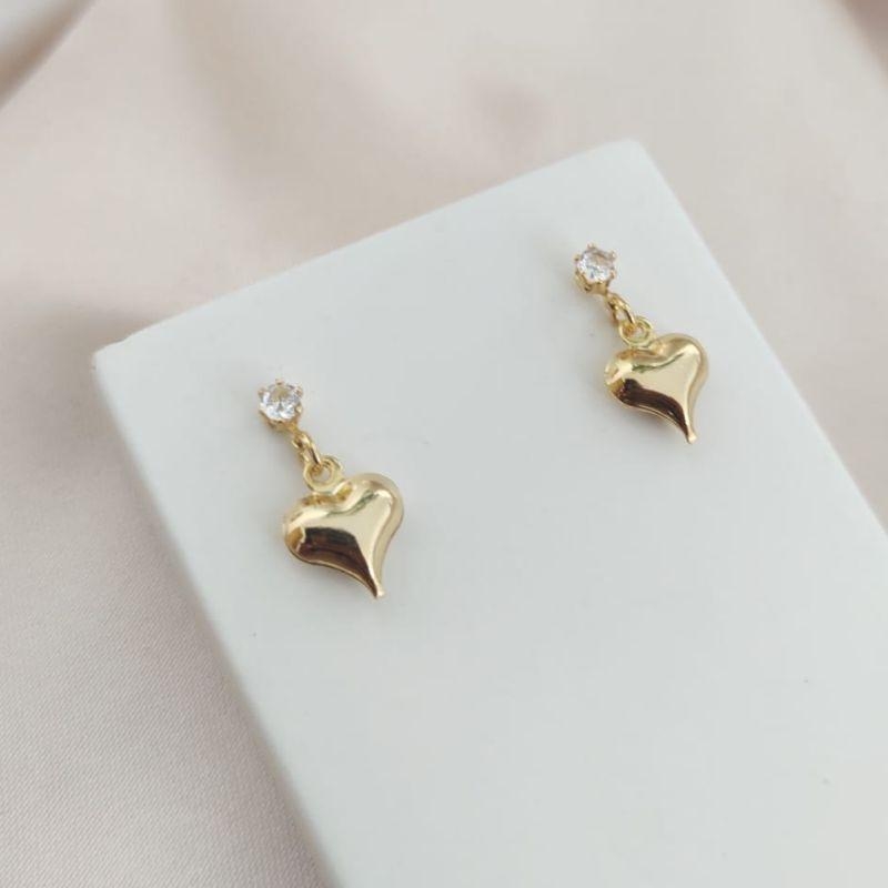 BRINCO COM PONTO DE LUZ E CORAÇÃO BOLEADO LISO