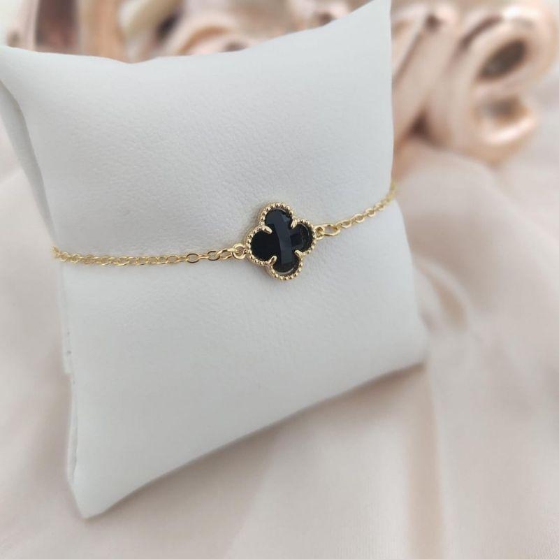 PULSEILRA EM ELO PORTUGUES COM FLOR PRETA