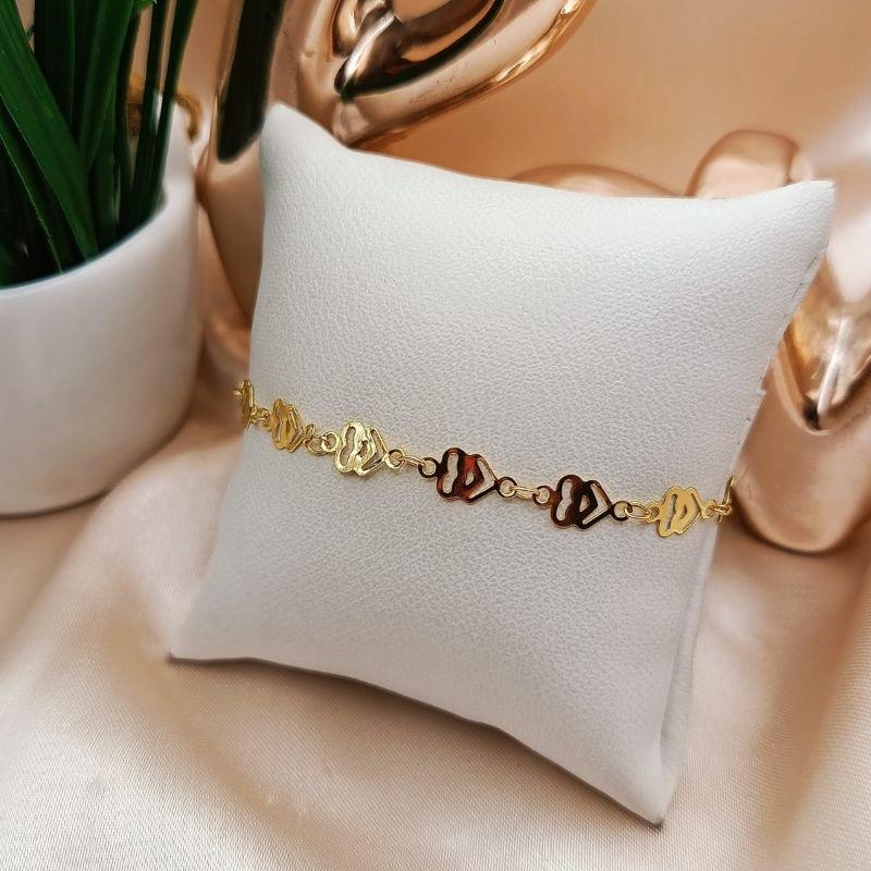 PULSEIRA COM CORAÇÕES DE LADO VAZADOS