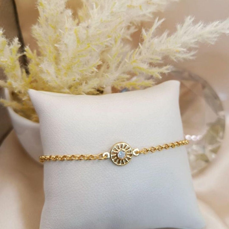 PULSEIRA COM CIRCULO VAZADO E PEDRA DE ZIRCONIA NO MEIO