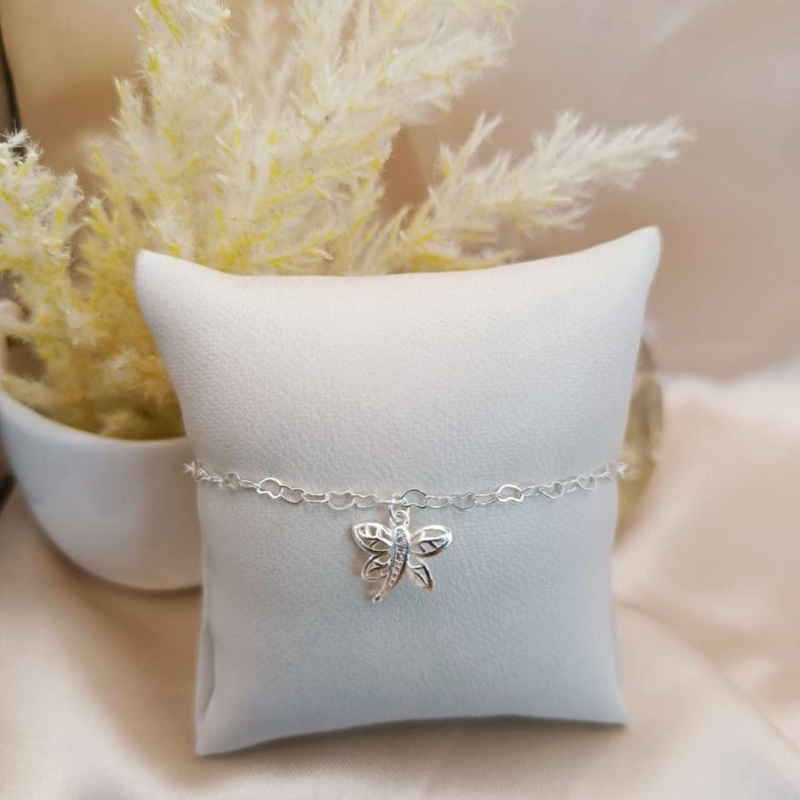 PULSEIRA LIBELOLA CRAVEJADO EM MICRO ZIRCONIA NO MEIO