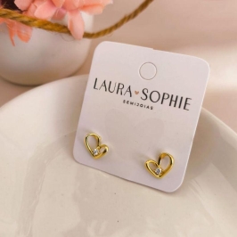 BRINCO CORAÇÃO TORTO COM PEDRA DE ZIRCONIA NO MEIO BRINCO CORAÇÃO TORTO COM PEDRA DE ZIRCONIA NO MEIO