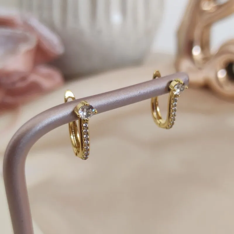 ARGOLA COM PONTO DE LUZ CRAVEJADO EM MICRO ZIRCONIA ARGOLA COM PONTO DE LUZ CRAVEJADO EM MICRO ZIRCONIA