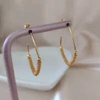 BRINCO ARGOLA OVAL METADE LISA E FOSCA