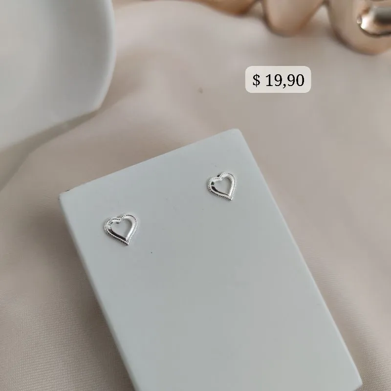 BRINCO CORAÇÃO VAZADO COM DETALHES CRAQUELADO NAS LATERAIS B. PRATA 925