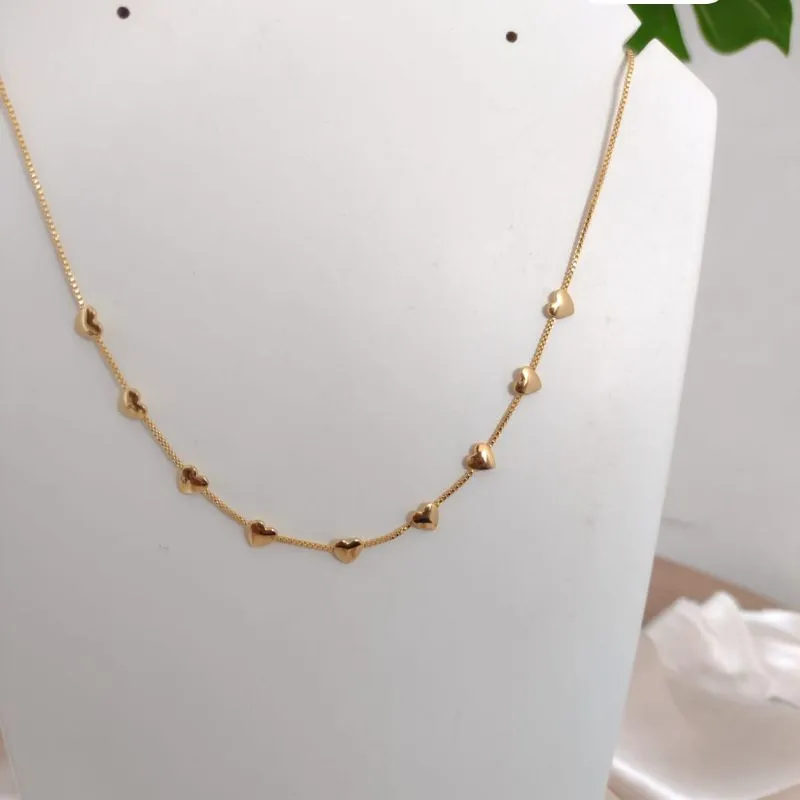 CHOKER COM PLACAS DE CORAÇÃO CHOKER COM PLACAS DE CORAÇÃO