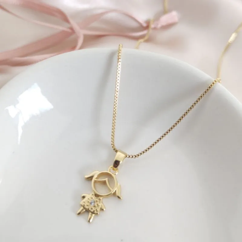 COLAR COM PINGENTE DE MENINA COM UM PONTO DE LUZ FILHOS