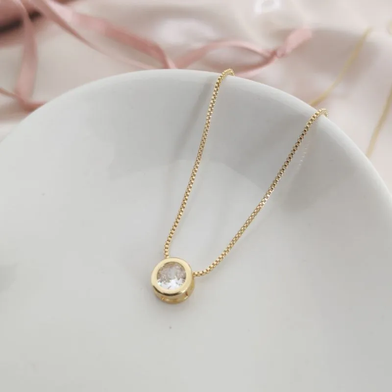 COLAR COM PINGENTE DE PONTO DE LUZ CAIXA FECHADA COLAR COM PINGENTE DE PONTO DE LUZ CAIXA FECHADA