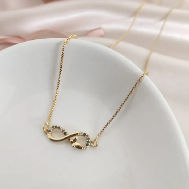 COLAR COM PINGENTE INFINITO CRAVEJADO EM MICRO ZIRCONIA E BORBOLETA LISA COLAR COM PINGENTE INFINITO CRAVEJADO EM MICRO ZIRCONIA E BORBOLETA LISA