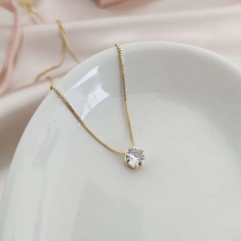 COLAR COM PINGENTE PONTO DE LUZ 9MM COLAR COM PINGENTE PONTO DE LUZ 9MM