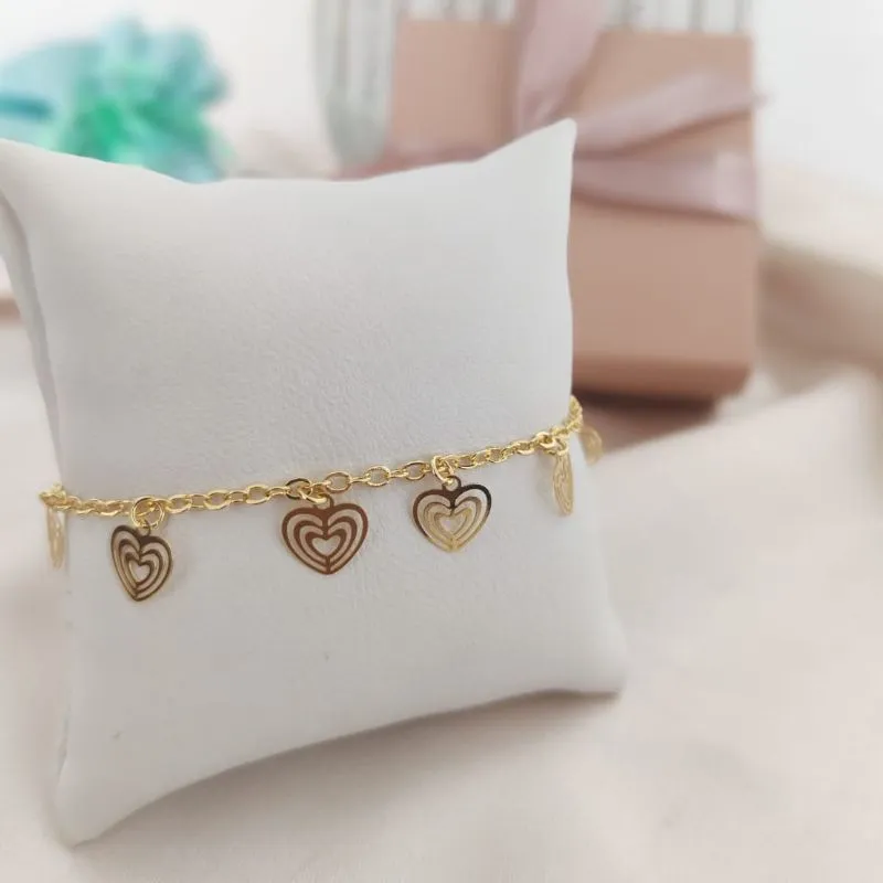 PULSEIRA EM ELO PORTUGUES COM 7 CORAÇÕES VAZADOS PULSEIRA EM ELO PORTUGUES COM 7 CORAÇÕES VAZADOS