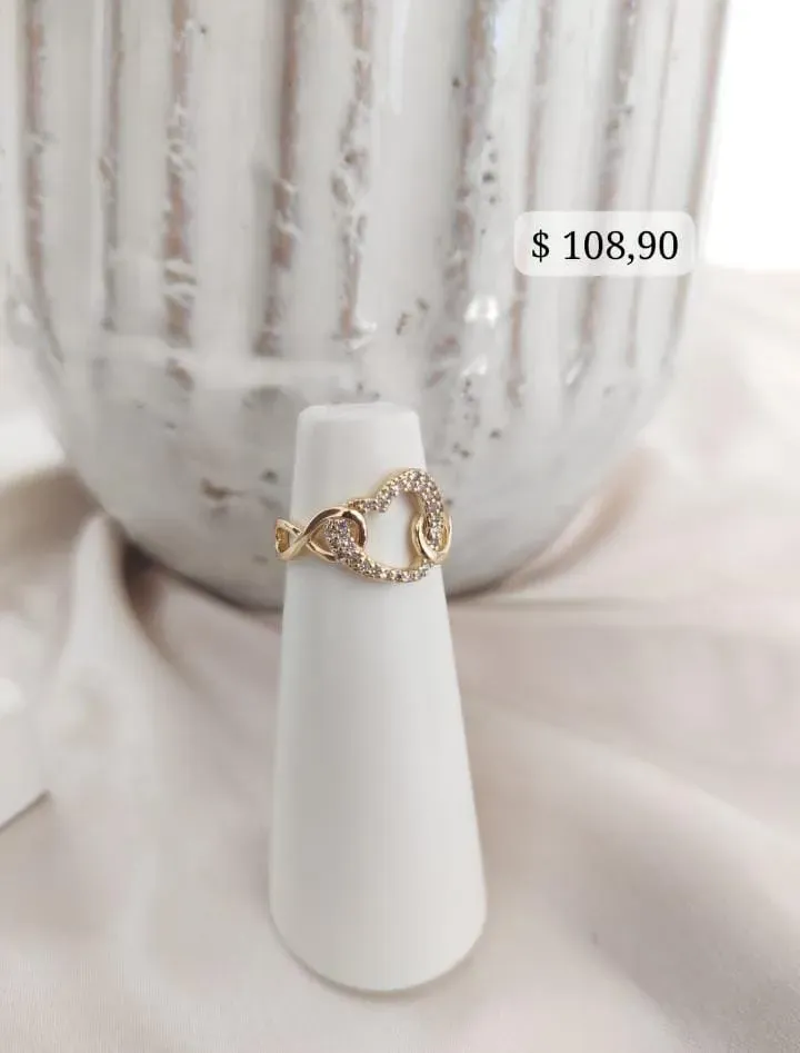 ANEL CORAÇÃO CRAVEJADO VAZADO COM INFINITO ANEL CORAÇÃO CRAVEJADO VAZADO COM INFINITO