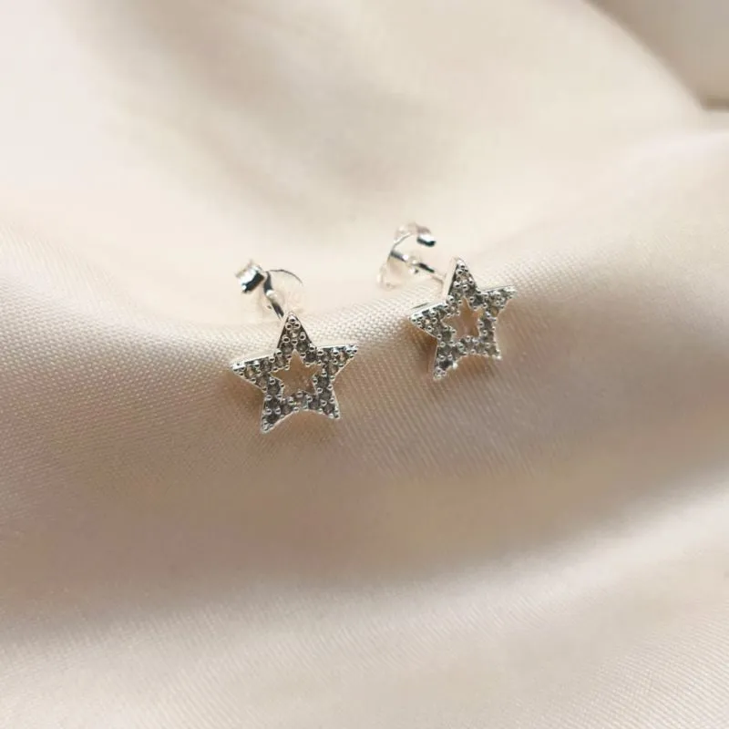 BRINCO ESTRELA VAZADO CRAVEJADA EM MICRO ZIRCONIA