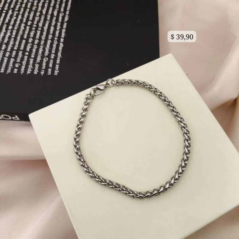 PULSEIRA EM AÇO ELO TRANÇADO TORCIDO