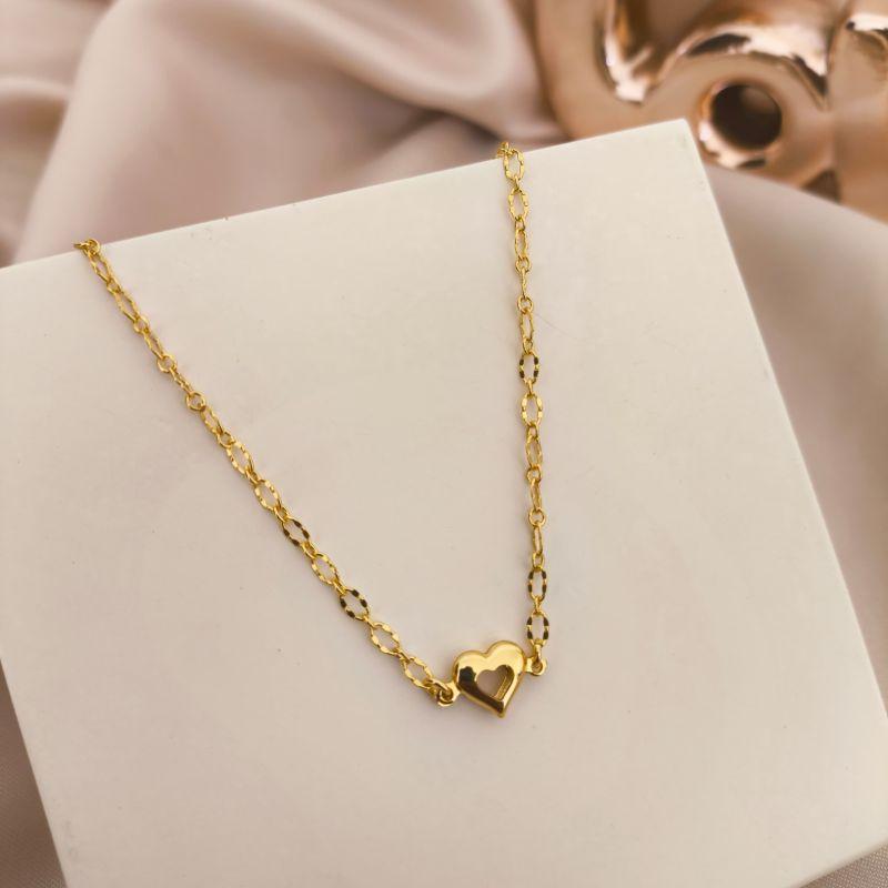 TORNOZELEIRA COM ELO DETALHADOS E CORAÇÃO BOLEADO VAZADO