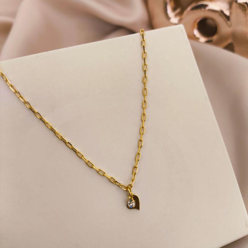 TORNOZELEIRA ELO CARTIER COM PLACA DE CORAÇÃO CRATADA E PONTO DE LUZ TORNOZELEIRA ELO CARTIER COM PLACA DE CORAÇÃO CRATADA E PONTO DE LUZ