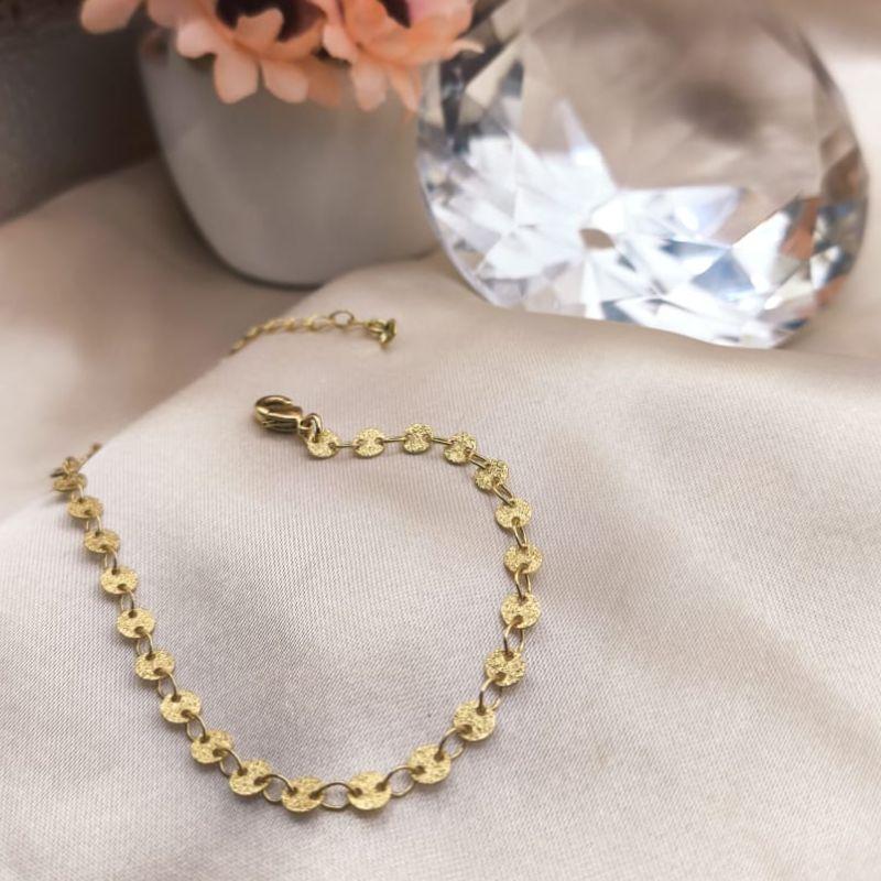 PULSEIRA COM PLASCAS REDONDAS PEQUENAS CRAQUELADAS