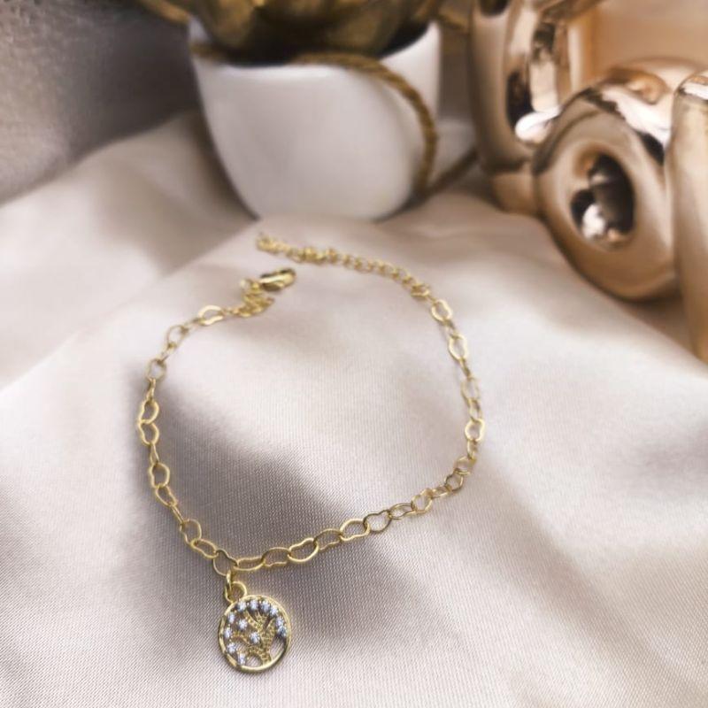 PULSEIRA DE CORAÇÕES ENTRELAÇADOS COM PINGENTE ARVORE DA VIDA CRAVEJADA EM MICRO ZIRCONIA