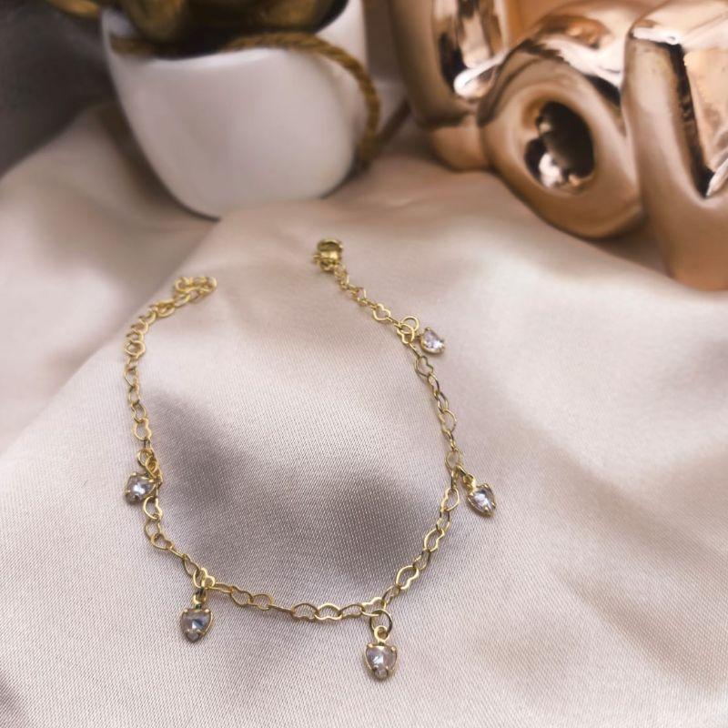 PULSEIRA DE CORAÇÕES ENTRELAÇADOS E 5 CORAÇÕES COM PEDRAS DE ZIRCONIA