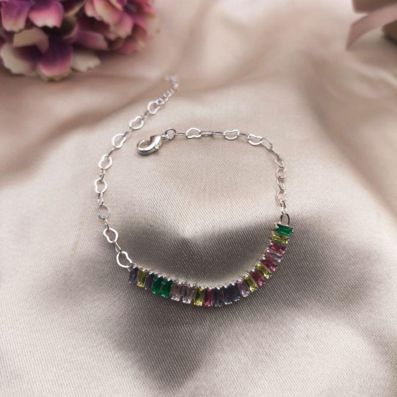 PULSEIRA DE CORAÇÕES ENTRELAÇADOS RIVIEIRA CRAVEJADA EM MICRO ZIRCONIA COLORIDAS