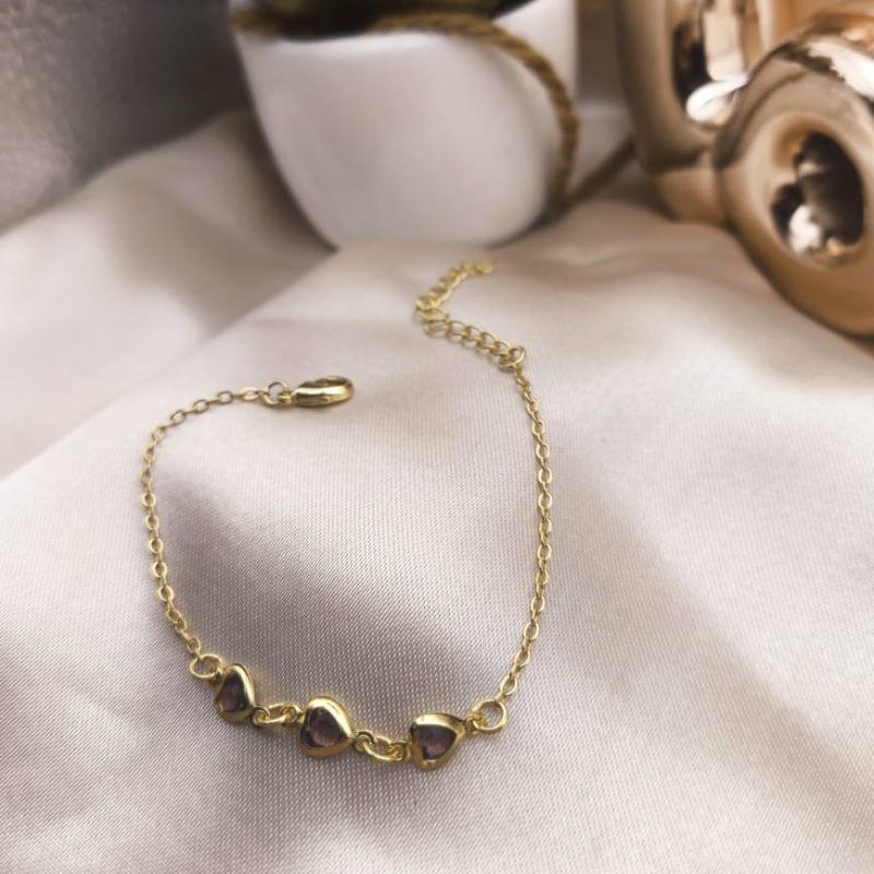PULSEIRA INFANTIL COM 3 CORAÇÕES LILAS EM PEDRA DE ZIRCONIA