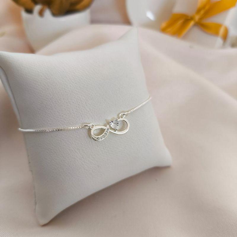 PULSEIRA INFINITO COM PEDRA EM FORMA DE CORAÇÃO E CRAVEJADO EM MICRO ZIRCONIA