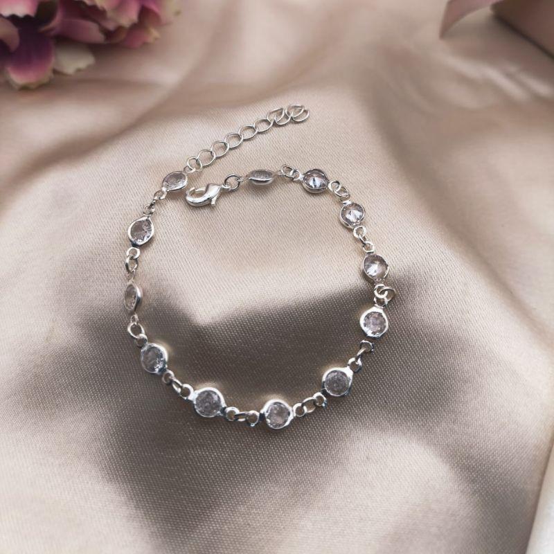 PULSERIA TODA EM PEDRAS DE ZIROCNIA REDONDA MÉDIA