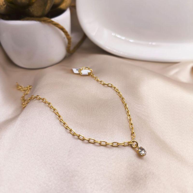 TORNOZELEIRA ELO CARTIER COM PEDRA DE ZIRTCONIA PENDURADA