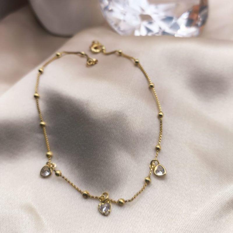 TORNOZELEIRA VENEZIANA COM MINI ESFERAS E PEDRA DE ZIRCONIA EM FORMA DE CORAÇÃO