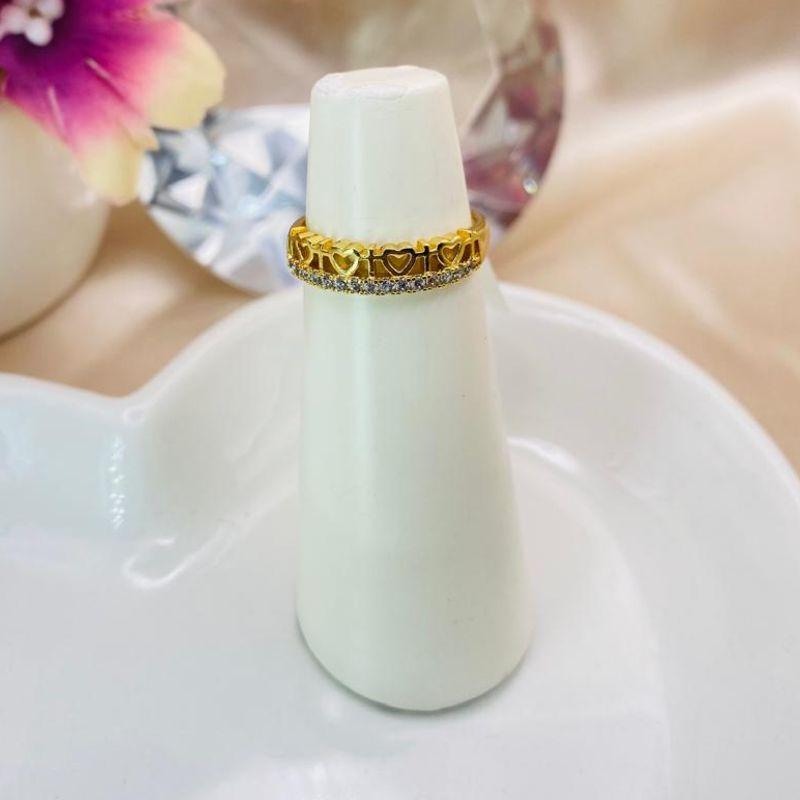 ANEL COM VARIOS CORAÇÕES VAZADOS E 1 FILA DE ZIRCONIA