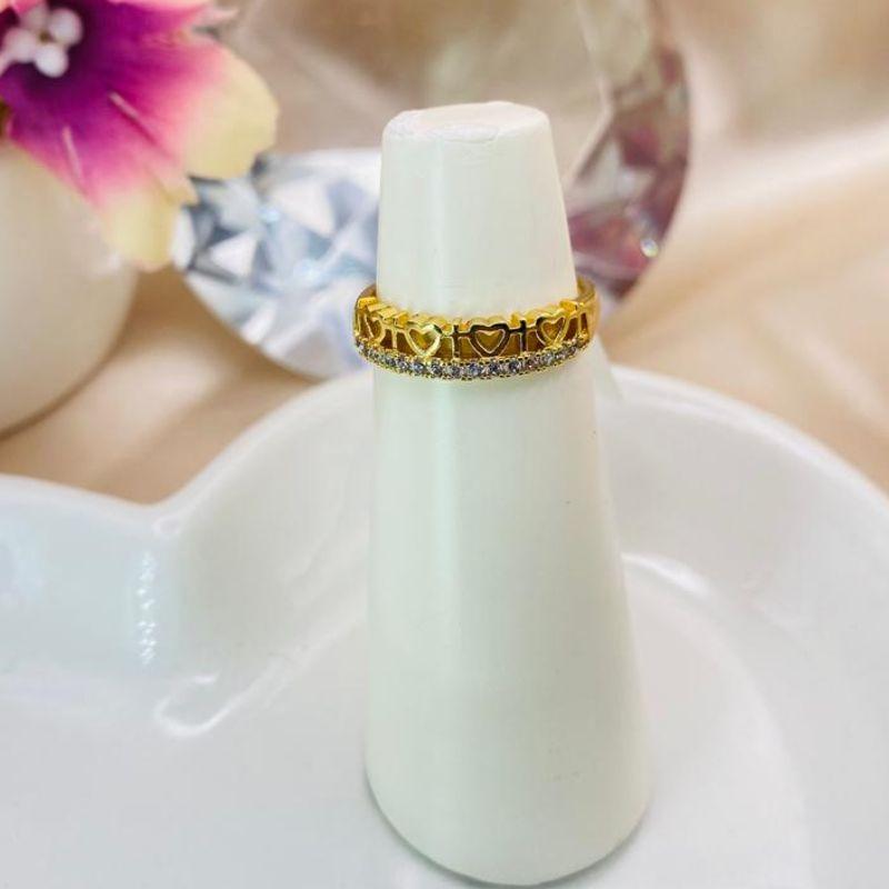 ANEL COM VARIOS CORAÇÕES VAZADOS E 1 FILA DE ZIRCONIA