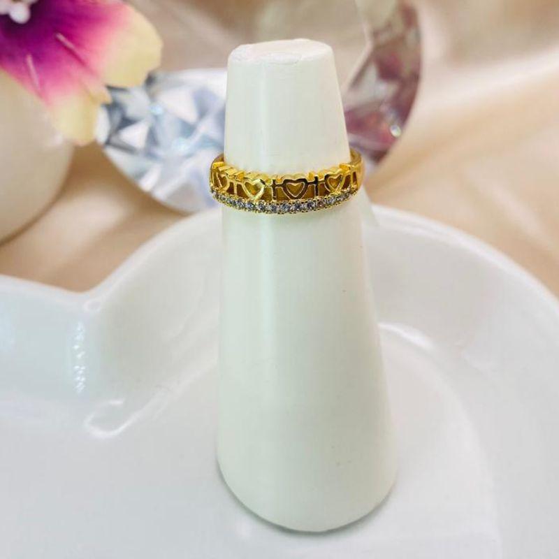 ANEL COM VARIOS CORAÇÕES VAZADOS E 1 FILA DE ZIRCONIA