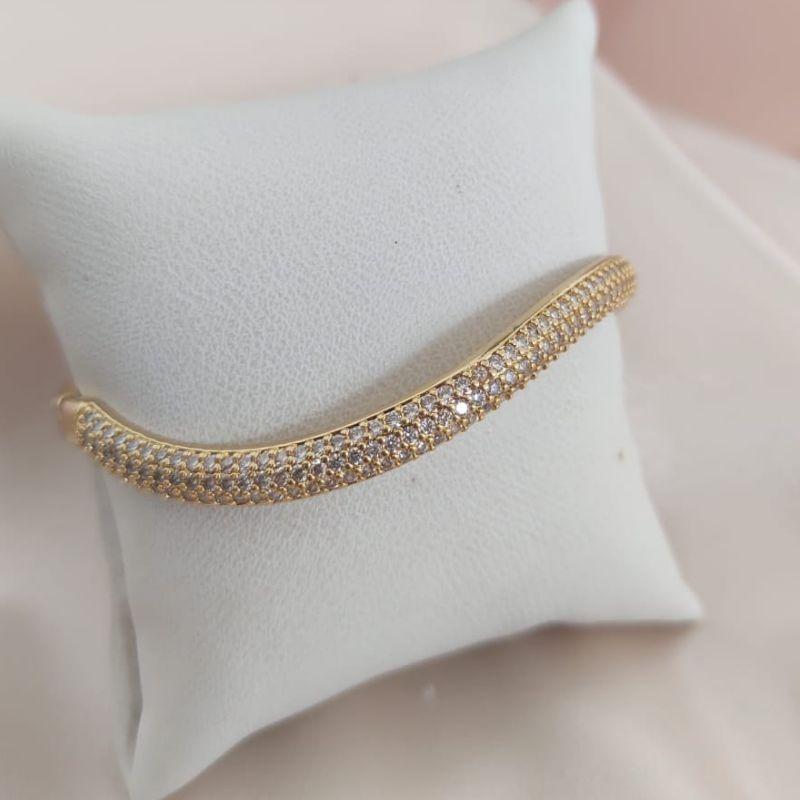 BRACELETE ONDULADO CRAVEJADO EM MICRO ZIRCONIA